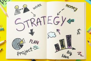 Concept of business strategy on yellow background